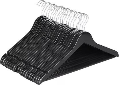 Set of black hangers with chrome hooks on a white background